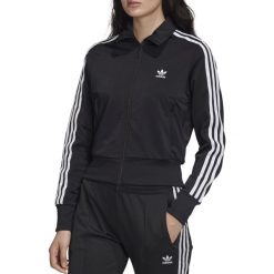 Adidas Firebird Track Jacket FM3269. Czarne bluzy damskie Adidas, bez wzorów, z poliesteru, bez rękawów, bez kaptura. W wyprzedaży za 199,99 zł.