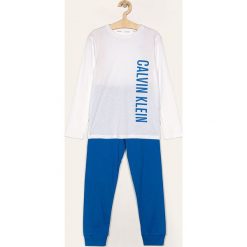 Calvin Klein Underwear - Piżama dziecięca 128-176 cm. Niebieskie piżamy chłopięce Calvin Klein Underwear, z nadrukiem, z elastanu, bez rękawów. W wyprzedaży za 139,90 zł.