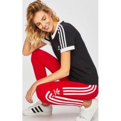 Adidas Originals - Legginsy. Czerwone spodnie damskie adidas Originals, s, bez wzorów, z elastanu. W wyprzedaży za 99,90 zł.
