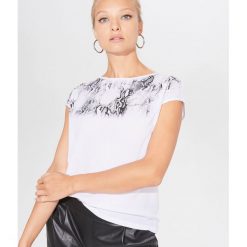 Koszulka z motywem animal print - Biały. Białe koszulki damskie Mohito, s, bez wzorów, bez kołnierzyka, bez rękawów. Za 59,99 zł.