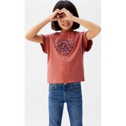 Mango Kids - T-shirt dziecięcy Julia 110-164 cm. Różowe bluzki dziewczęce Mango Kids, z aplikacjami, z bawełny, z okrągłym kołnierzem, z krótkim rękawem, krótkie, bez kaptura. Za 59,90 zł.
