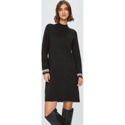 Calvin Klein - Sukienka. Czarne sukienki damskie Calvin Klein, na co dzień, s, bez wzorów, z bawełny, casualowe, z golfem, z długim rękawem, długie, mini, proste. Za 599,90 zł.