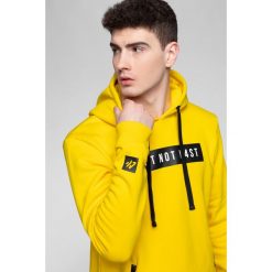 Bluza męska BLM202 - żółty. Żółte bluzy męskie 4f, m, bez wzorów, z dzianiny, z kapturem, bez rękawów, z kapturem. Za 119,99 zł.