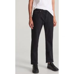 Jeansy z bawełny organicznej - Czarny. Czarne jeansy męskie Reserved, m, bez wzorów. Za 129,99 zł.