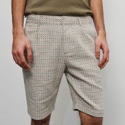 Wzorzyste szorty chino - Beżowy. Brązowe spodenki i szorty męskie Reserved, m, bez wzorów. Za 129,99 zł.