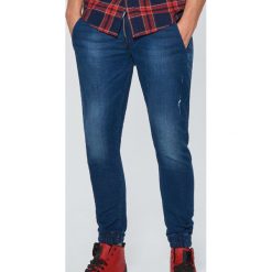 Jeansy SLIM JOGGER - Granatowy. Niebieskie jeansy męskie marki Cropp, m, z jeansu. W wyprzedaży za 49,99 zł.