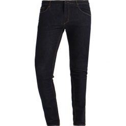 Jeansy męskie: Whyred SYD Jeans Skinny Fit raw indigo