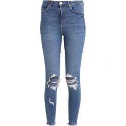 Gina Tricot CURVED Jeans Skinny Fit blue. Niebieskie jeansy damskie relaxed fit marki Gina Tricot. Za 209,00 zł.