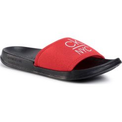 Klapki CALVIN KLEIN SWIMWEAR - Slide KW0KW01054 XBG. Czerwone klapki damskie Calvin Klein Swimwear, bez wzorów, z tworzywa sztucznego, bez obcasa. Za 179,00 zł.