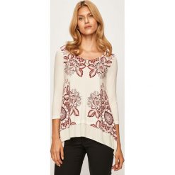 Desigual - Bluzka. Białe bluzki damskie Desigual, s, z nadrukiem, z elastanu, z okrągłym kołnierzem, bez rękawów. W wyprzedaży za 149,90 zł.