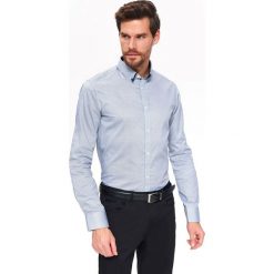 Koszula wzorzysta o kroju slim. Niebieskie koszule męskie Top Secret, na lato, m, bez wzorów, z tkaniny, eleganckie, bez kołnierzyka, bez rękawów. W wyprzedaży za 49,99 zł.