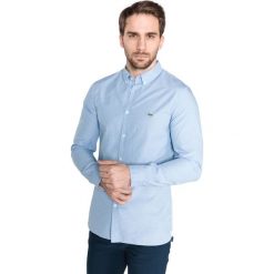 Lacoste Koszula Niebieski. Niebieskie koszule męskie Lacoste, w paski, z bawełny, bez kołnierzyka, z długim rękawem. Za 490,95 zł.