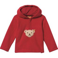 Bluza w kolorze czerwonym. Czerwone bluzy niemowlęce Steiff, z aplikacjami, bez rękawów, bez kaptura. W wyprzedaży za 58,95 zł.