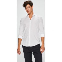 Trussardi Jeans - Koszula Colla. Niebieskie koszule męskie marki Trussardi Jeans, z elastanu, klasyczne, z włoskim kołnierzykiem, z długim rękawem. W wyprzedaży za 199,90 zł.