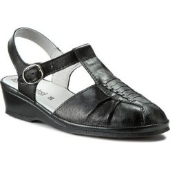 Sandały COMFORTABEL - 710704 Schwarz 1. Czarne klapki damskie Comfortabel, bez wzorów, ze skóry, bez obcasa, na obcasie. W wyprzedaży za 189,00 zł.