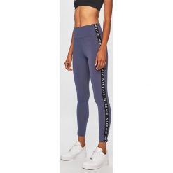 Nike Sportswear - Legginsy. Fioletowe spodnie damskie Nike Sportswear, s, z elastanu. Za 139,90 zł.