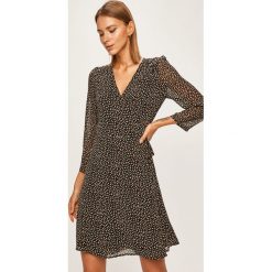 Answear - Sukienka. Czarne sukienki damskie ANSWEAR, na co dzień, s, bez wzorów, z poliesteru, casualowe, bez kołnierzyka, bez rękawów, mini, rozkloszowane. W wyprzedaży za 119,90 zł.