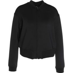 Nike Performance Kurtka sportowa black/black. Czarne kurtki sportowe damskie marki Nike Performance, l, z elastanu. W wyprzedaży za 272,35 zł.