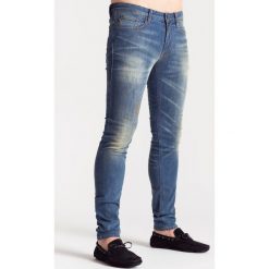 Niebieskie jeansy męskie z przetarciami. Niebieskie jeansy męskie JOOP! Jeans, m, z aplikacjami. Za 319,60 zł.