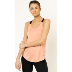 Koszulka techniczna NIKE Dri-Fit AO9791. Różowe koszulki damskie polo Nike, xs, bez wzorów, z poliesteru, bez rękawów. W wyprzedaży za 99,00 zł.