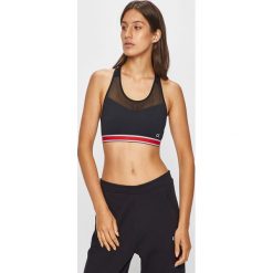 Calvin Klein Performance - Biustonosz sportowy. Czarne biustonosze sportowe damskie Calvin Klein Performance, s, bez wzorów, z elastanu. W wyprzedaży za 179,90 zł.