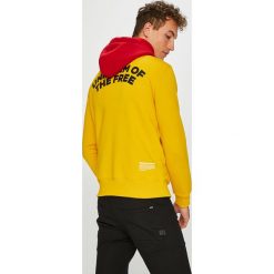 G-Star Raw - Bluza. Żółte bluzy męskie G-Star RAW, m, z nadrukiem, z elastanu, retro, z kapturem, bez rękawów, z kapturem. W wyprzedaży za 299,90 zł.
