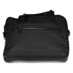 Torba w kolorze czarnym na laptopa - (S)38 x (W)30 x (G)10 cm. Czarne torby na laptopa Calvin Klein, w paski, z tkaniny. W wyprzedaży za 479,95 zł.