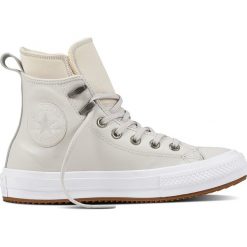 Białe Wodoodporne Trampki Converse Chuck Taylor All Star. Białe trampki i tenisówki damskie Molly.pl, bez wzorów, ze skóry, bez zapięcia. Za 539,00 zł.