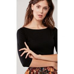 Bluzka Ribolla czarna XS czarny. Czarne bluzki damskie Marie Zélie, s, w paski, z elastanu, bez kołnierzyka, bez rękawów. Za 97,00 zł.