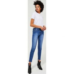 Jeansy skinny. Niebieskie jeansy damskie Moodo, s. Za 119,99 zł.