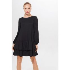 Sukienka z poliestru Repreve® Eco Aware - Czarny. Czarne sukienki damskie Mohito, s. Za 119,99 zł.