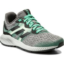 Buty adidas - Aerobounce W CG4579 Cblack/Aergrn/Hiregr. Szare buty do biegania damskie marki Adidas, z materiału. W wyprzedaży za 299,00 zł.