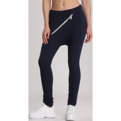 Granatowe Spodnie Lorairena. Niebieskie spodnie damskie Renee, xl, z dresówki. Za 79,99 zł.