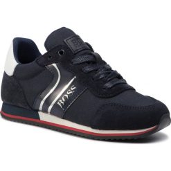Sneakersy BOSS - J29184 D Navy 849. Niebieskie trampki chłopięce Boss, bez wzorów, ze skóry, na sznurówki. W wyprzedaży za 339,00 zł.