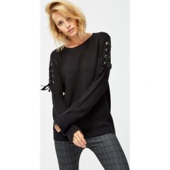 Sweter z wiązaniem. Swetry damskie Moodo, s, bez wzorów, bez rękawów, bez kaptura. Za 49,99 zł.