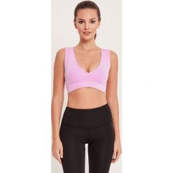 Cardio Bunny - Biustonosz sportowy Buddha. Różowe biustonosze sportowe damskie Cardio Bunny, xs, bez wzorów, z elastanu. W wyprzedaży za 79,90 zł.