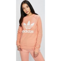 Adidas Originals - Bluza. Pomarańczowe bluzy damskie adidas Originals, z nadrukiem, z bawełny, bez rękawów, bez kaptura. W wyprzedaży za 179,90 zł.