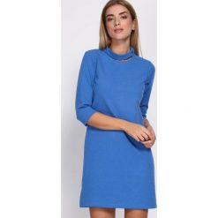 Niebieska Sukienka House Of Cards. Niebieskie sukienki mini damskie marki Born2be, s, z okrągłym kołnierzem. Za 49,99 zł.