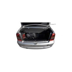 OPEL ASTRA CABRIO, 1998-2009 TORBY DO BAGAŻNIKA 4 SZT KJUST - 7031019. Torby podróżne KJUST, bez wzorów, z kauczuku, klasyczne. Za 930,00 zł.