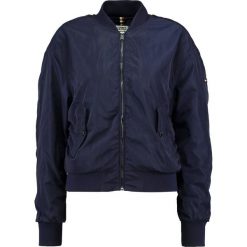 Tommy Jeans ESSENTIAL Kurtka Bomber dress blues. Niebieskie marynarki damskie Tommy Jeans, l, bez wzorów, z poliesteru. W wyprzedaży za 389,35 zł.