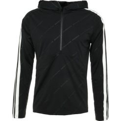 J.LINDEBERG CALIN Koszulka sportowa black. Czarne koszulki męskie marki J.LINDEBERG, m, bez wzorów, z poliesteru, bez kołnierzyka, z długim rękawem, długie. Za 379,00 zł.