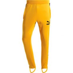 Spodnie dresowe męskie: Puma VINTAGE TRACK PANTS Spodnie treningowe mineral yellow/black