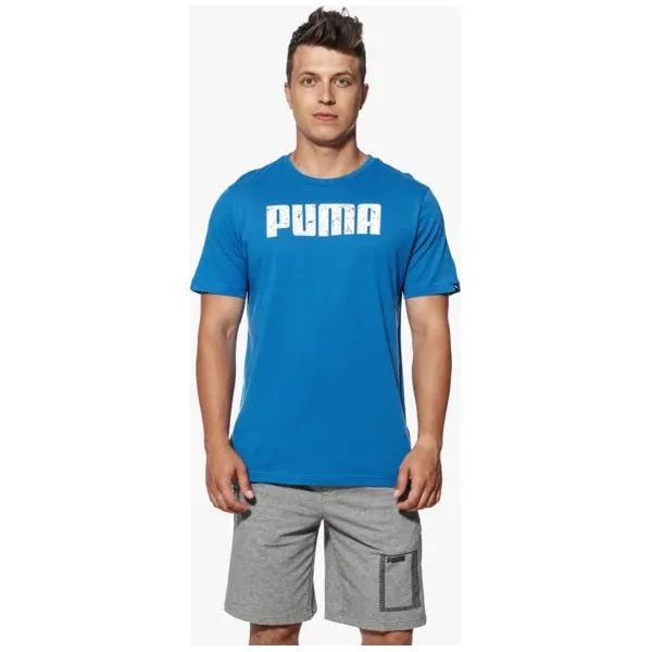 Puma Koszulka Ss Graphic , niebieski, rozmiar M. Niebieskie koszulki męskie Puma, m, bez wzorów, z elastanu, klasyczne, z klasycznym kołnierzykiem, bez rękawów. W wyprzedaży za 79,99 zł.