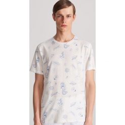 T-shirt z rysunkowym nadrukiem - Kremowy. Białe t-shirty damskie Reserved, s, z nadrukiem, bez kołnierzyka. Za 39,99 zł.