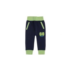 Spodnie niemowlęce chłopięce sportowe. Czarne spodnie niemowlęce TXM, bez wzorów, sportowe. Za 15,99 zł.