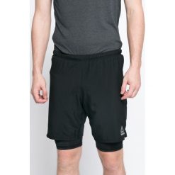 Reebok - Szorty. Czarne spodenki sportowe męskie Reebok, z elastanu, sportowe. W wyprzedaży za 129,90 zł.