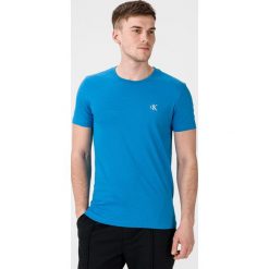 Calvin Klein Essentials Koszulka Niebieski. Niebieskie podkoszulki męskie Calvin Klein, xl, bez wzorów, z bawełny, bez kołnierzyka, z krótkim rękawem, krótkie. Za 152,95 zł.