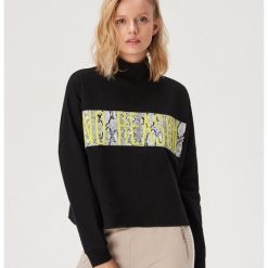 Luźna bluza z golfem - Czarny. Czarne bluzy damskie Sinsay, s, bez wzorów, bez rękawów, bez kaptura. Za 49,99 zł.