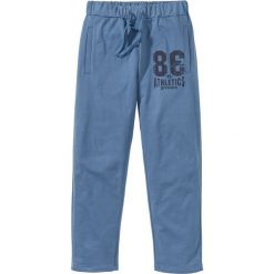 Spodnie sportowe bonprix niebieski dżins. Niebieskie spodnie męskie bonprix, s, bez wzorów, sportowe. Za 74,99 zł.