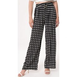 Czarne Spodnie Prevention. Czarne spodnie damskie Born2be, m, bez wzorów, z tkaniny, eleganckie, długie. Za 29,99 zł.